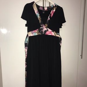 Black flare dress with colorful floral accents